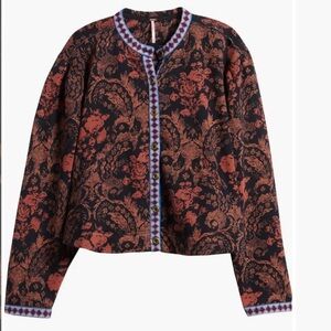 Free People Black and Red jacket with Intricate Design.

NWOT